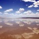 Water from the Queensland floods flowing into Lake Eyre, photograph by Kelly Barnes